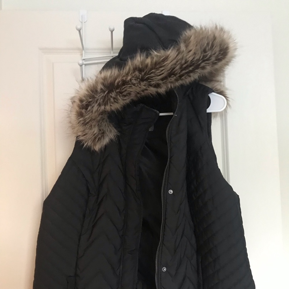 Vest with furry hood